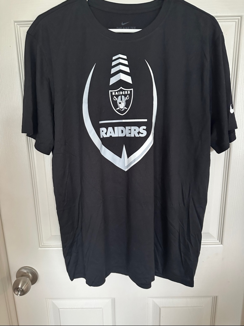 Nike Black Tee with White Raiders Shield Graphic